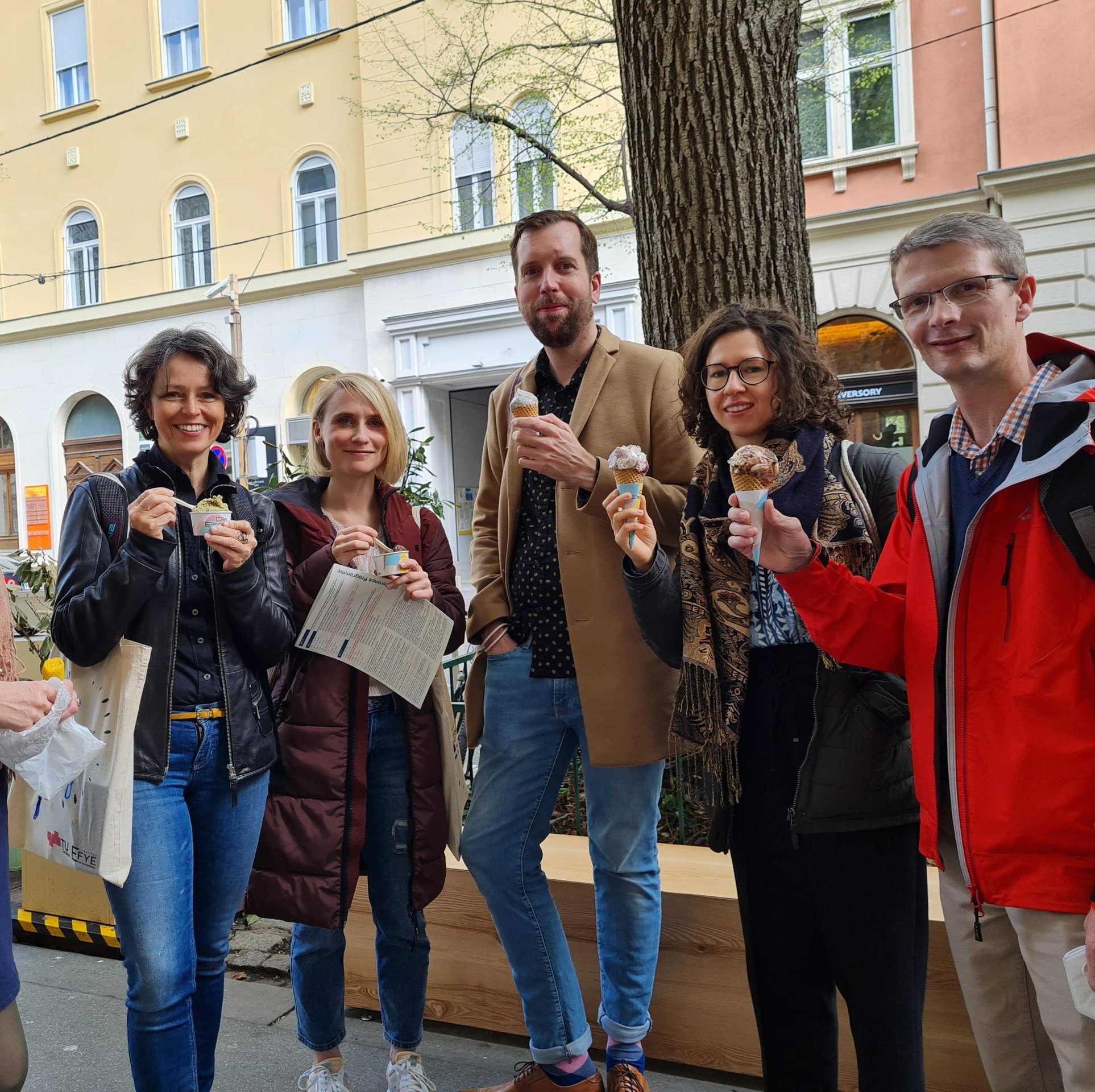 A group of people taking part at the EFYE give away walk while eating ice cream.